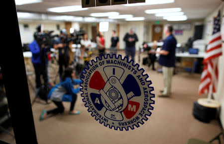 Mike Evans (R), a group leader with the International Association of Machinists and Aerospace Workers, speaks to the media at IAM headquarters after workers rejected union representation at the Boeing South Carolina plant in North Charleston, South Carolina, U.S. February 15, 2017. REUTERS/Randall Hill