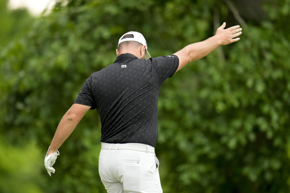 Jon Rahm, of Spain, reacts to his tee shot on the 11th hole during the first round of the PGA Championship golf tournament at the Valhalla Golf Club, Thursday, May 16, 2024, in Louisville, Ky. (AP Photo/Jeff Roberson)