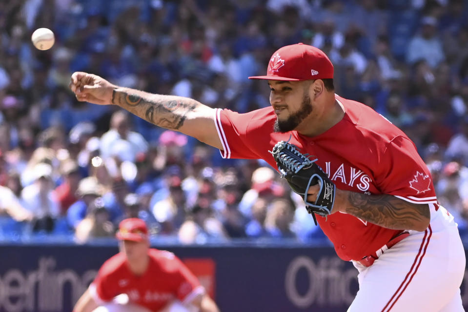 Toronto Blue Jays starting pitcher Max Castillo throws to a Kansas City Royals batter during the first inning of a baseball game, Saturday, July 16, 2022 in Toronto. (Jon Blacker/The Canadian Press via AP)