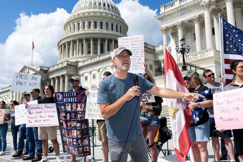 Comedian and activist Jon Stewart speaks during a rally to call on the Senate to pass the PACT Act on Aug. 1, 2022. <a href="https://www.gettyimages.com/detail/news-photo/comedian-and-activist-jon-stewart-speaks-during-a-rally-to-news-photo/1242247731?adppopup=true" rel="nofollow noopener" target="_blank" data-ylk="slk:Bill Clark/CQ-Roll Call, Inc via Getty Images;elm:context_link;itc:0;sec:content-canvas" class="link ">Bill Clark/CQ-Roll Call, Inc via Getty Images</a>