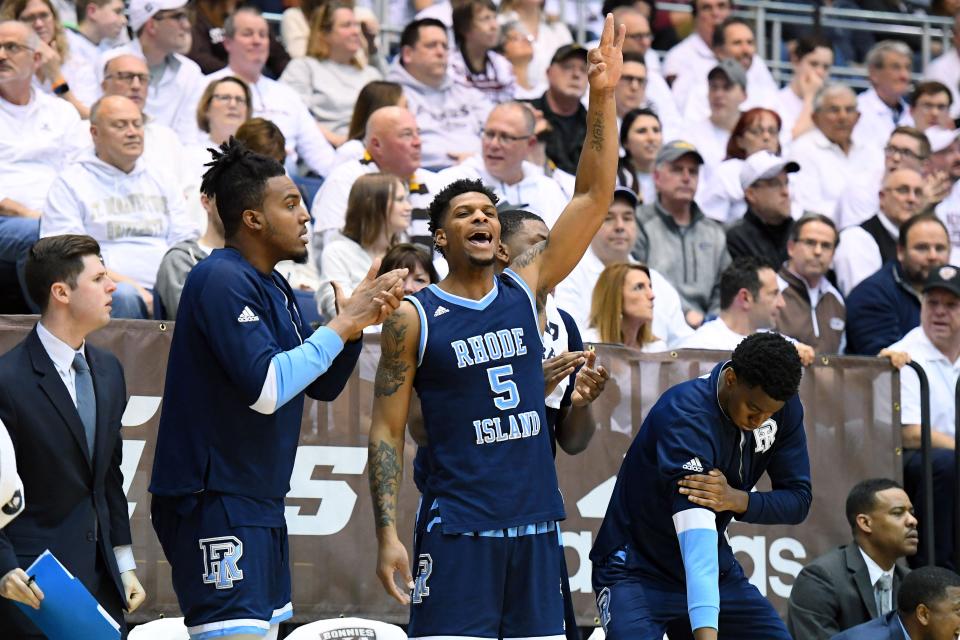 Rams forward Ryan Preston (5) reacts from the bench to a 3-point basket against St. Bonaventure in a game on Feb. 16, 2018. A Brooklyn native, Preston graduated from URI in 2019.