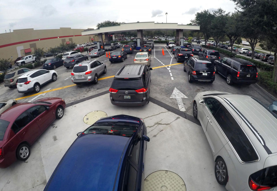 <p>Drivers wait in line for gasoline at the Costco in Altamonte Springs, Fla., ahead of the anticipated arrival of Hurricane Irma on Wednesday, Sept. 6, 2017. (Photo: Joe Burbank/Orlando Sentinel/TNS via Getty Images) </p>