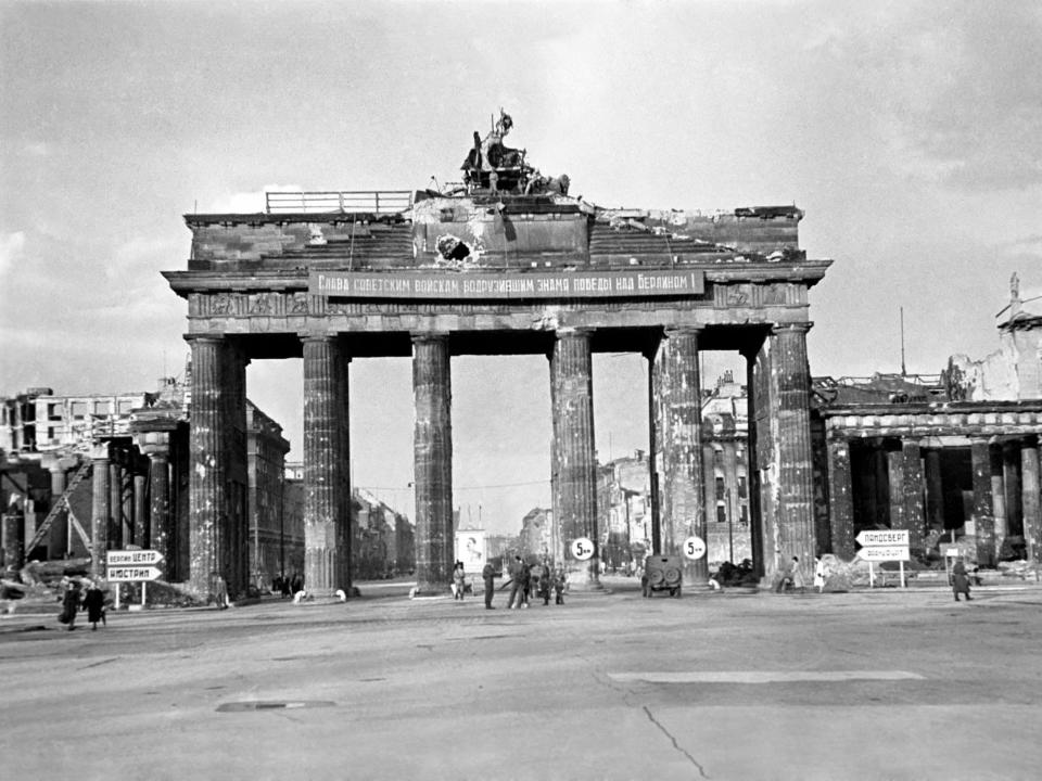 Scenes showing rubble and destruction at the Brandenburg Gate in Berlin