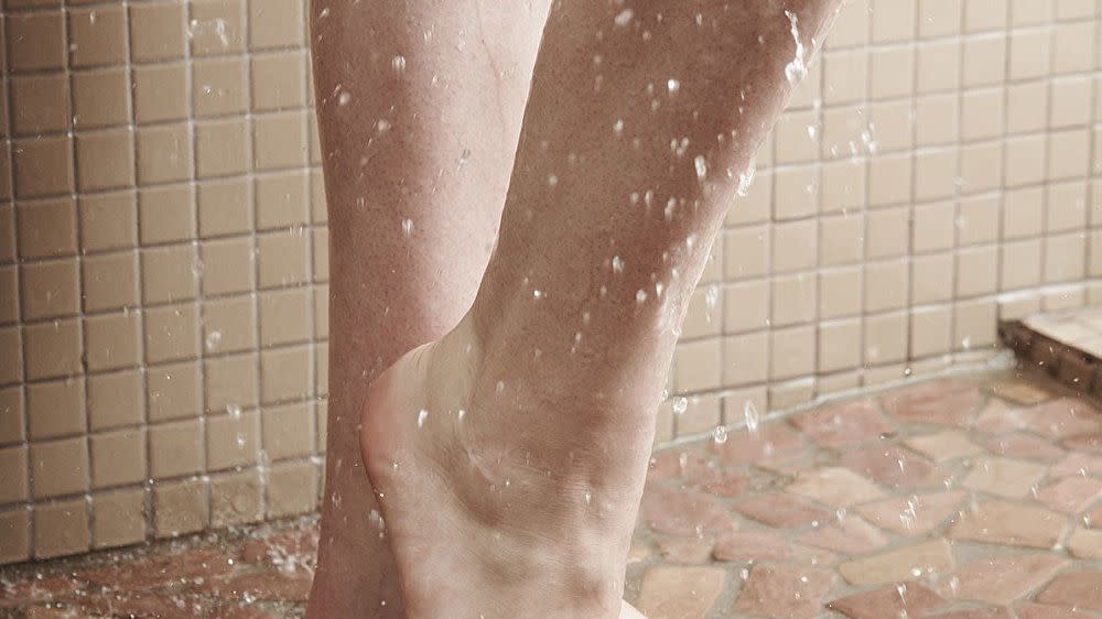 woman-feet-shower-drain_0.jpg