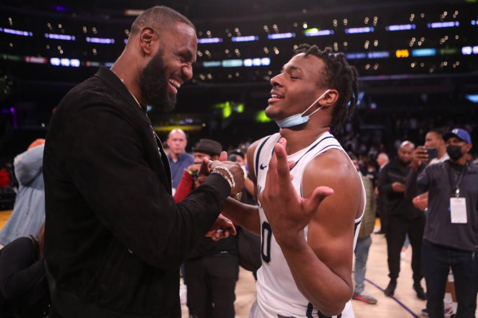 Lakers star LeBron James, left, congratulates his son, Bronny, after Sierra Canyon defeated St. Vincent-St. Mary's.