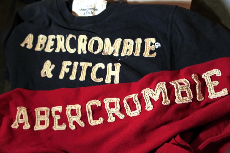 In this Nov. 14, 2011 photo, Abercrombie & Fitch sweat shirts are displayed at a store in Phoenix. When it comes to flying, it seems that Abercrombie & Fitch CEO Michael S. Jeffries is obsessed with the details. A 40-plus page manual that was filed with court documents in relation to an age discrimination suit by a former pilot outlined a list of instructions for crew members aboard the CEO's Gulfstream jet that stipulated everything from how to arrange the toilet paper to what type of cologne should be worn. (AP Photo/Ross D. Franklin)