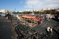 African migrants build a makeshift house after their houses burned, on the outskirts of Casablanca, Morocco October 29, 2018. REUTERS/Youssef Boudlal