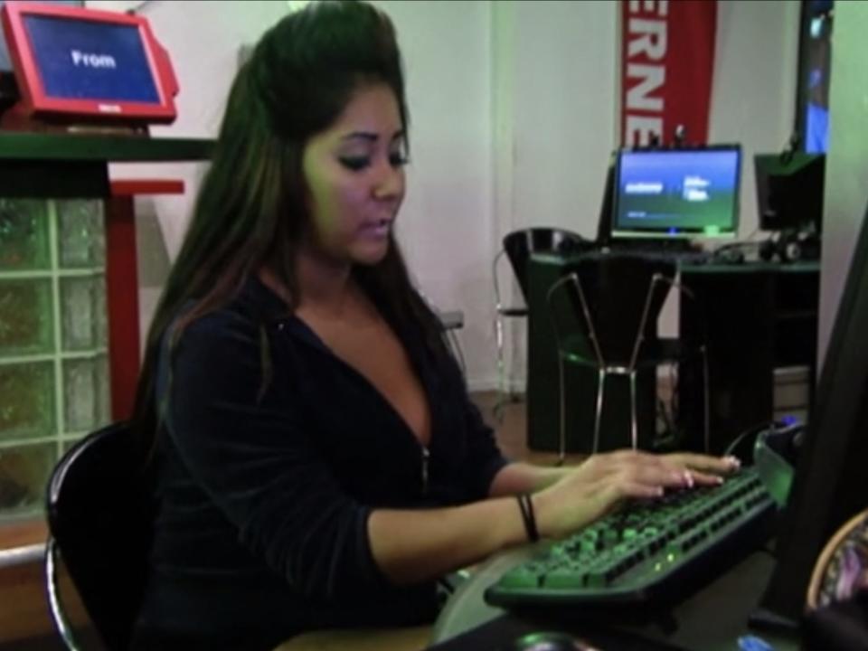 Nicole "Snooki" Polizzi types a letter during this scene from season two of MTV's "Jersey Shore."