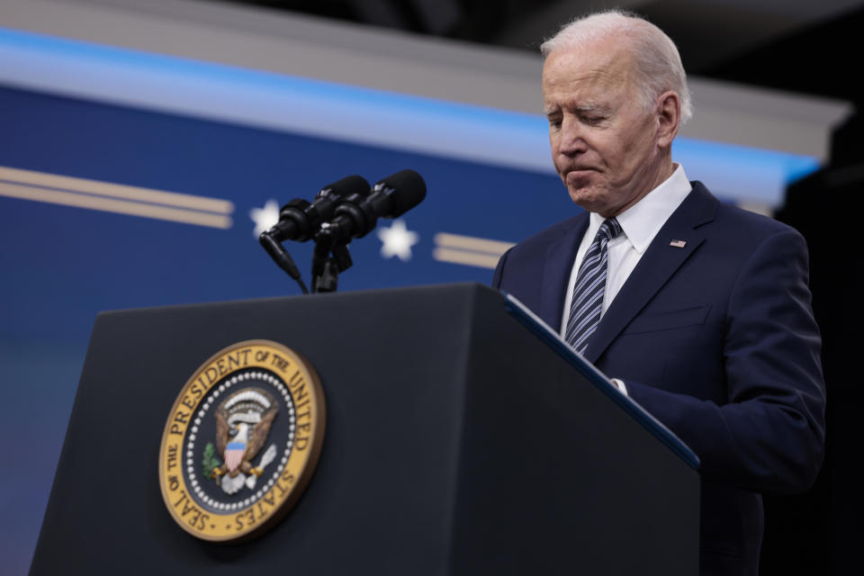 President Biden delivers remarks on gas prices from a podium at the White House.