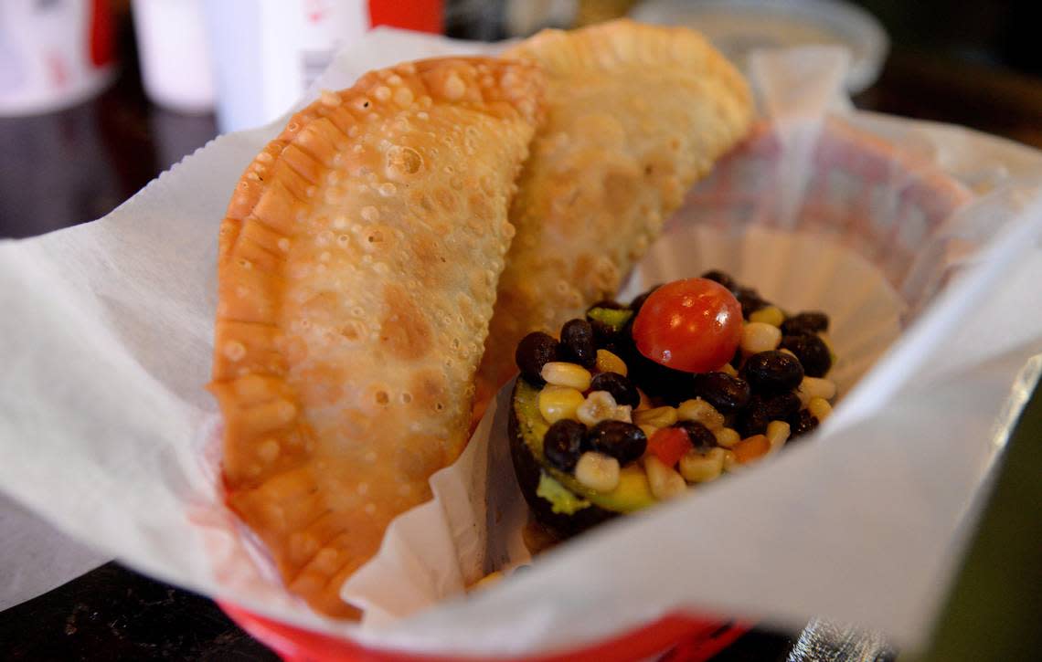 A bean and a beef empanada with a stuffed avocado at My Grandma’s Empanadas.