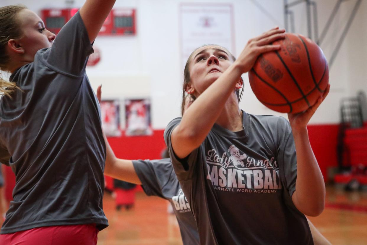 Emma Romanczyk shoots during practice at Incarnate Word Academy during practice on Monday, Feb. 12, 2024, in Corpus Christi, Texas.