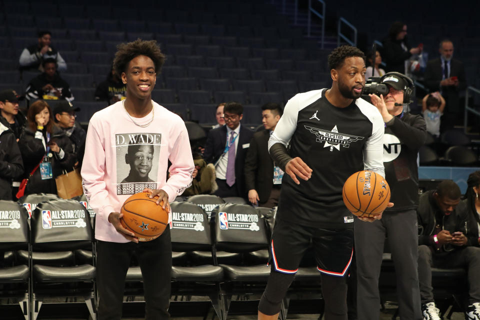 NBA star Dwyane Wade (R) is about to send his 18-year old son Zaire (L) off to college. (Photo by Issac Baldizon/NBAE via Getty Images)