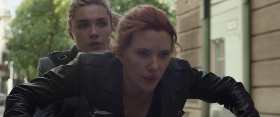 Natasha Romanoff (Scarlett Johansson, right) reconnects with her "sister" Yelena (Florence Pugh) in "Black Widow."