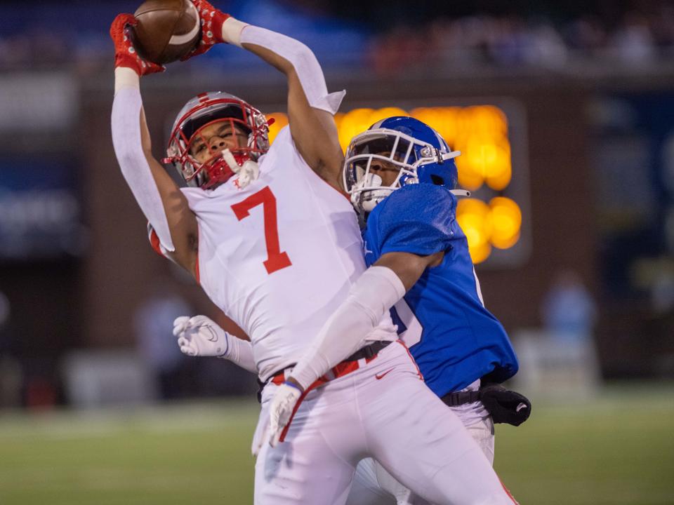 Baylor's Amari Jefferson (7) comes down with the catch over a McCallie defender during the Division II-3A championship game at Finley Stadium in Chattanooga, Tenn., Thursday, Nov. 30, 2023.