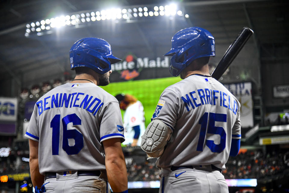 HOUSTON, TEXAS - JULY 06: Andrew Benintendi #16 of the Kansas City Royals talks to Whit Merrifield #15 of the Kansas City Royals during the game against the Houston Astros at Minute Maid Park on July 06, 2022 in Houston, Texas. (Photo by Logan Riely/Getty Images)