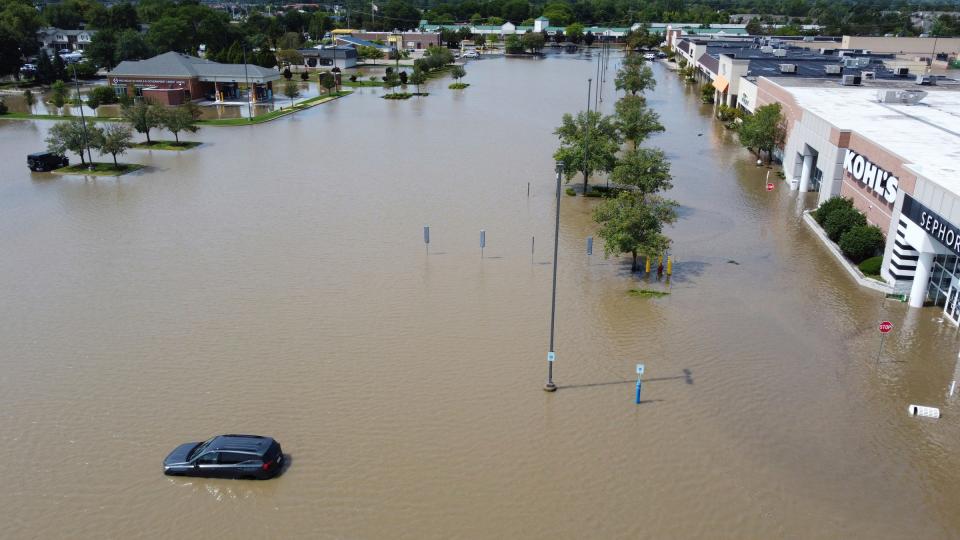 After hammering rains Sheldon Road in Canton at Ford Road sustained flooding around major shopping stores including Kohl's at New Towne Center on Thursday, Aug. 24, 2023.