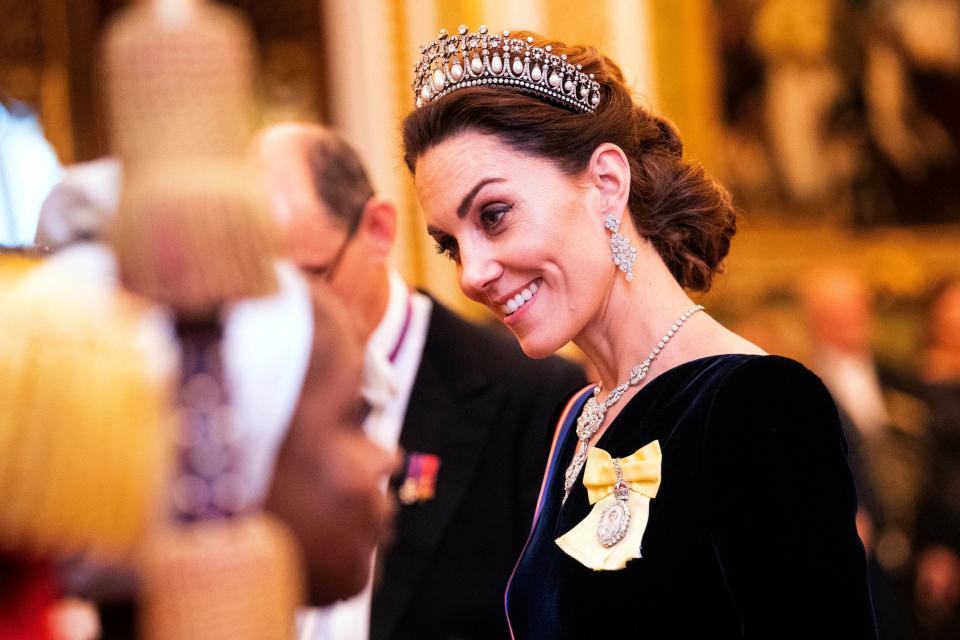Kate Middleton looks breath-taking in an official dress and silver crown