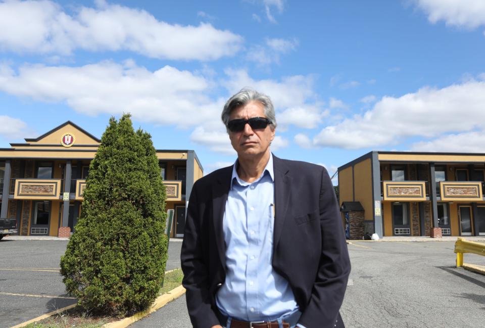 Former FBI agent Mark Rossini in front Congress Inn in South Hackensack, NJ where 9/11 hijackers Khalid al Mihdhar and Namaf al Hazmi checked in on July 13, 2001. Rossini says that when he was an FBI agent he and a colleague knew of a terrorist meeting in Malaysia but wasn’t allowed to notify the CIA because sharing information between the agencies was illegal at that time.
