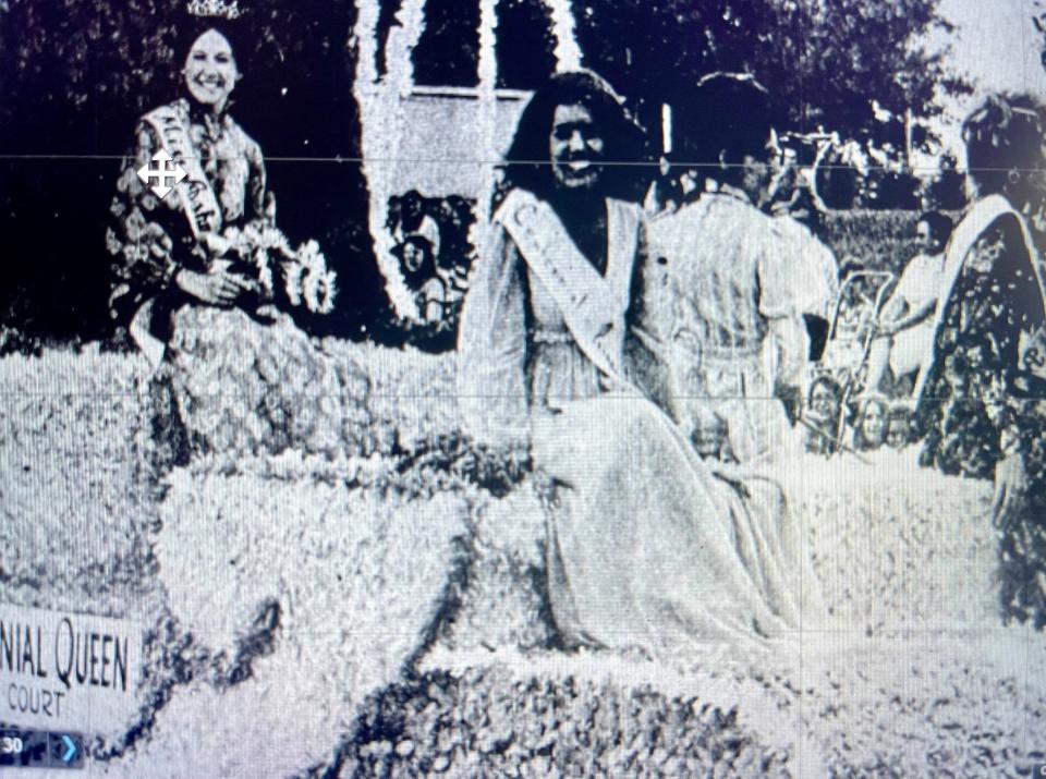 Miss Ashwaubenon Centennial Queen Bonnie Olsen and her court ride on a float for Ashwaubenon's 100th anniversary celebration in 1972.