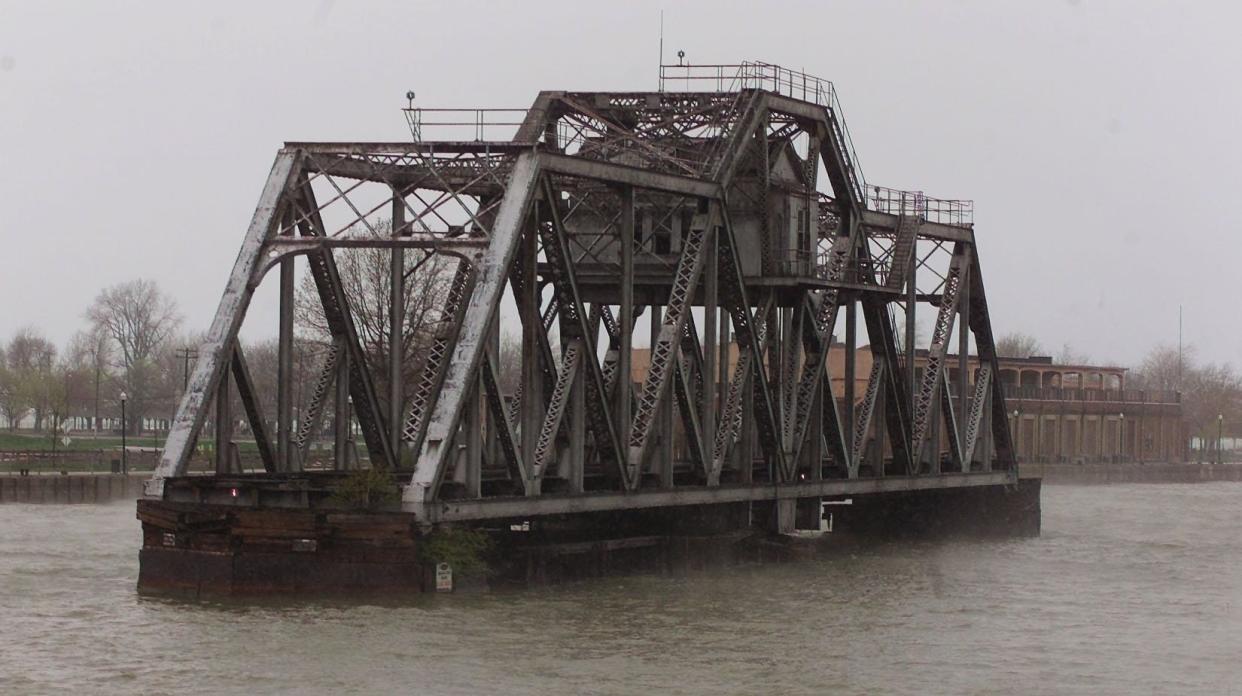 A photo of the Hojack Swing Bridge taken from the Irondequoit side of the Genesee River, Monday, April 22, 2002. The bridge was abandoned in the open position in 1994 and demolished nearly two decades later.