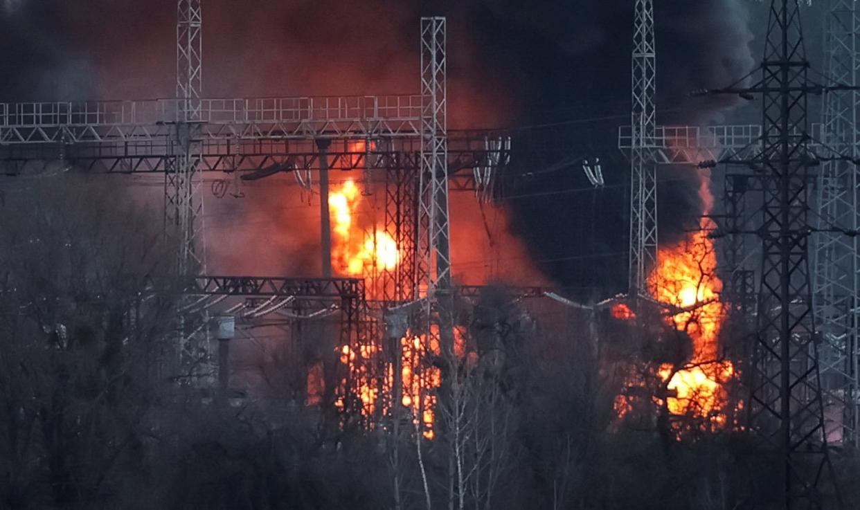 Smoke and fire are seen around high-voltage lines at a site of a Russian missile strike, amid Russia's attack on Ukraine, outside Kharkiv, Ukraine (REUTERS)