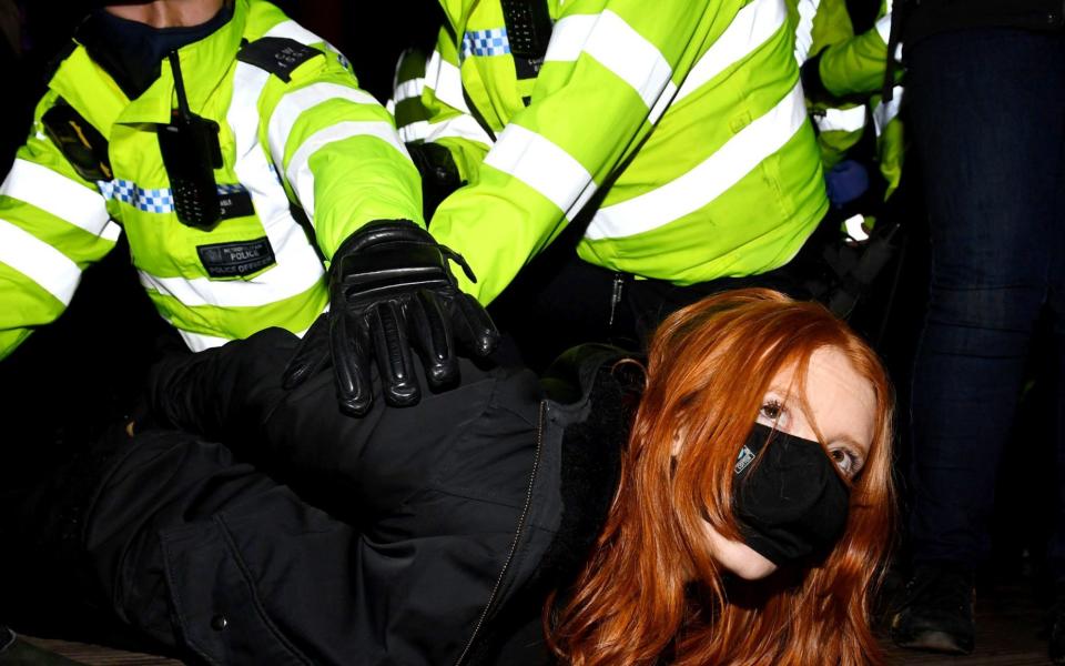 A woman is arrested at a vigil in memory of murdered Sarah Everard