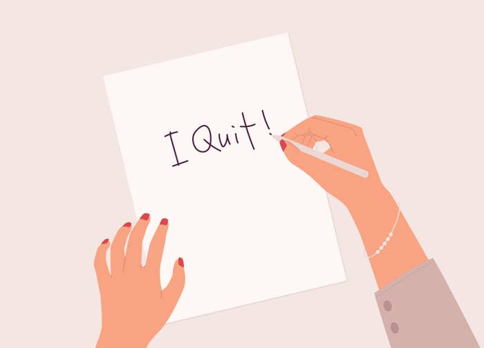 Graphic of someone writing I Quit on paper