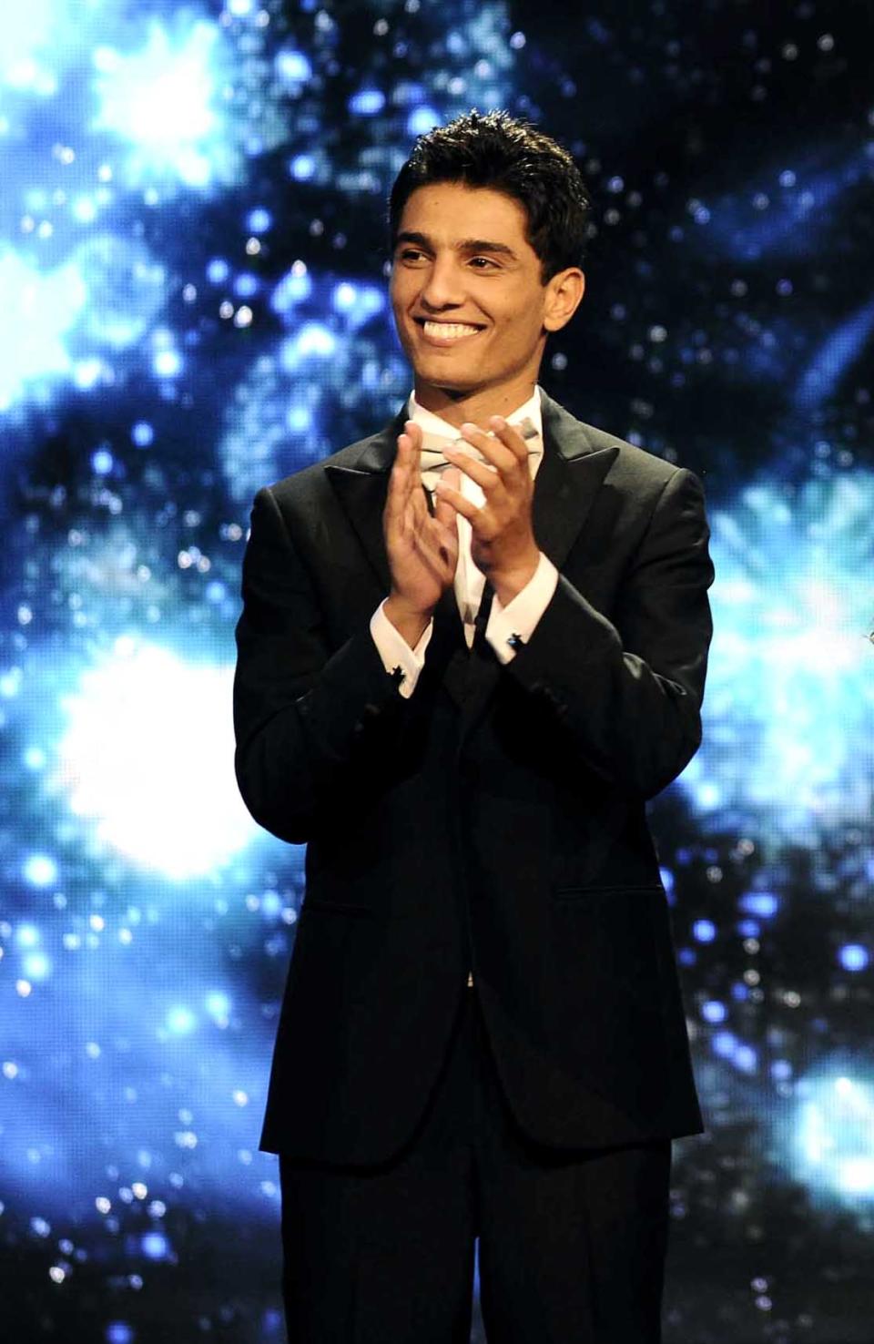 In this Saturday, June 22, 2013 photo released by the MBC Group, singer Mohammed Assaf is seen on the Arab Idol stage in Beirut, Lebanon. On Saturday night, Assaf became the first Palestinian to win the Arab world’s version of American Idol, setting off wild celebrations across the Palestinian territories. After the victory, Palestinian President Mahmoud Abbas declared the singer an honorary ambassador. (AP Photo/MBC Group)