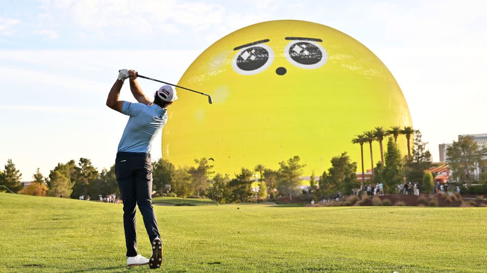 Homa plays a shot in front of the Las Vegas Sphere. - David Becker/Getty Images for Netflix