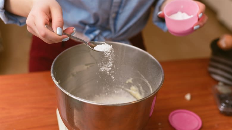 Adding baking soda to dough