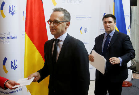German Foreign Minister Heiko Maas (L) and his Ukrainian counterpart Pavlo Klimkin leave after a news conference following their talks in Kiev, Ukraine January 18, 2019. REUTERS/Valentyn Ogirenko