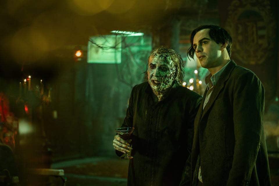 Dracula (Nicolas Cage, left) needs the help of his longtime servant Renfield (Nicholas Hoult) to get human blood and heal his body in the horror comedy "Renfield."