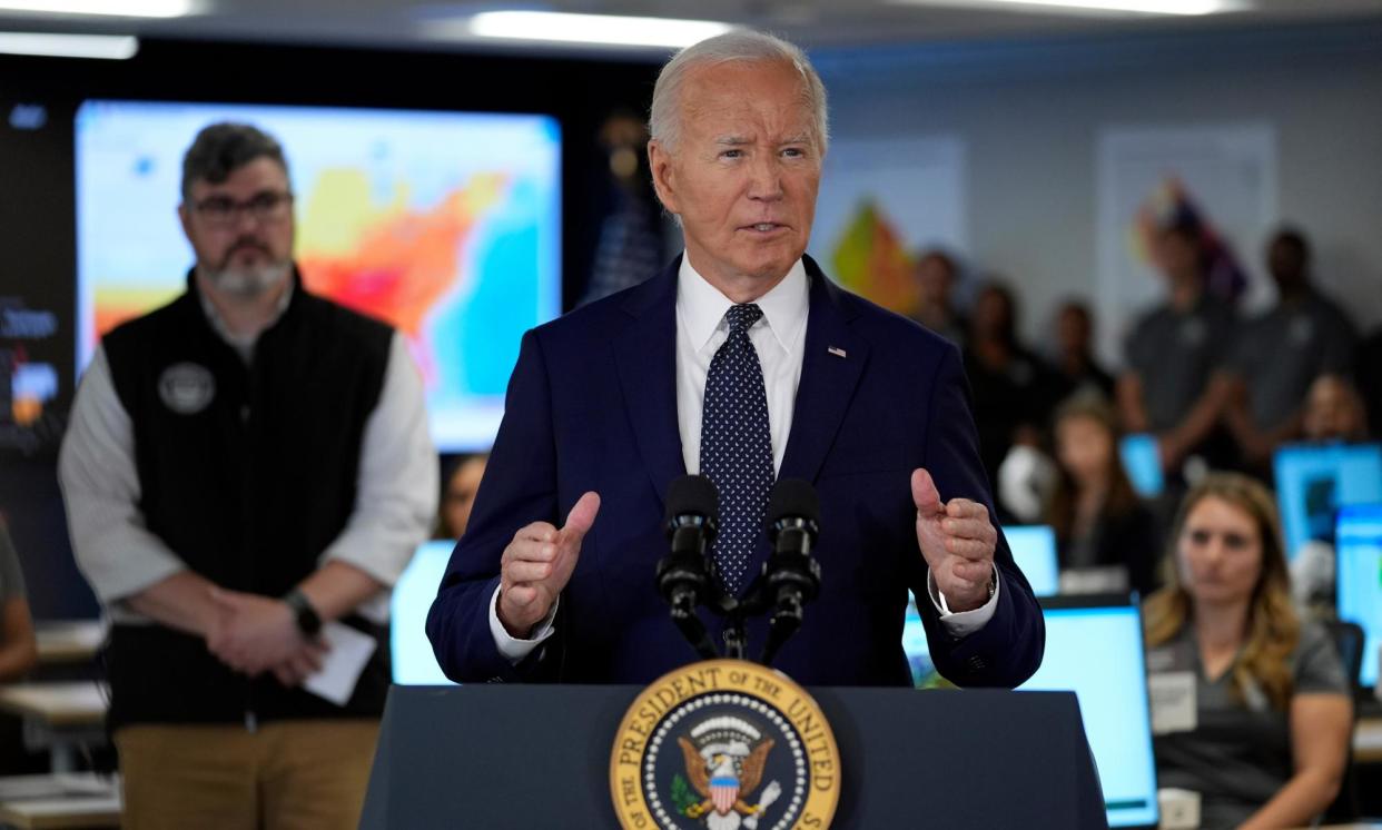 <span>Biden delivers a speech during a visit to the DC Emergency Operations Center on Tuesday.</span><span>Photograph: Evan Vucci/AP</span>