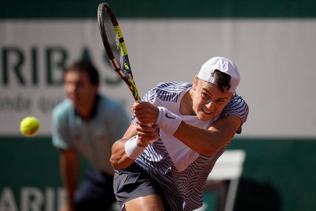 Holger Rune strikes a backhand in his win over Chris Eubanks 