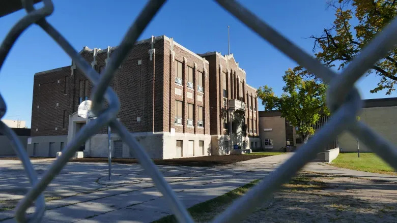 As of Friday, At least 28 cases so far have been linked to Winnipeg's John Pritchard School, up by 21 since Sept. 16. (Credit: Trevor Brine/CBC)