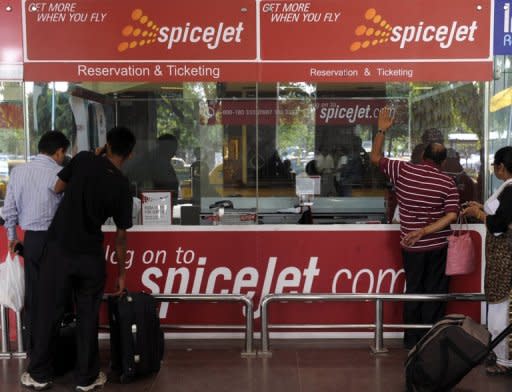 Passengers are seen here at a Spicejet ticket counter at the Netaji Subhash Chandra Bose Airport in Kolkata. Alarm bells have been ringing for India's air passengers, anxious about the idea of semi-trained fraudulent pilots being responsible for their lives, and for airline bosses, who have been hiring crew at a furious pace in recent years