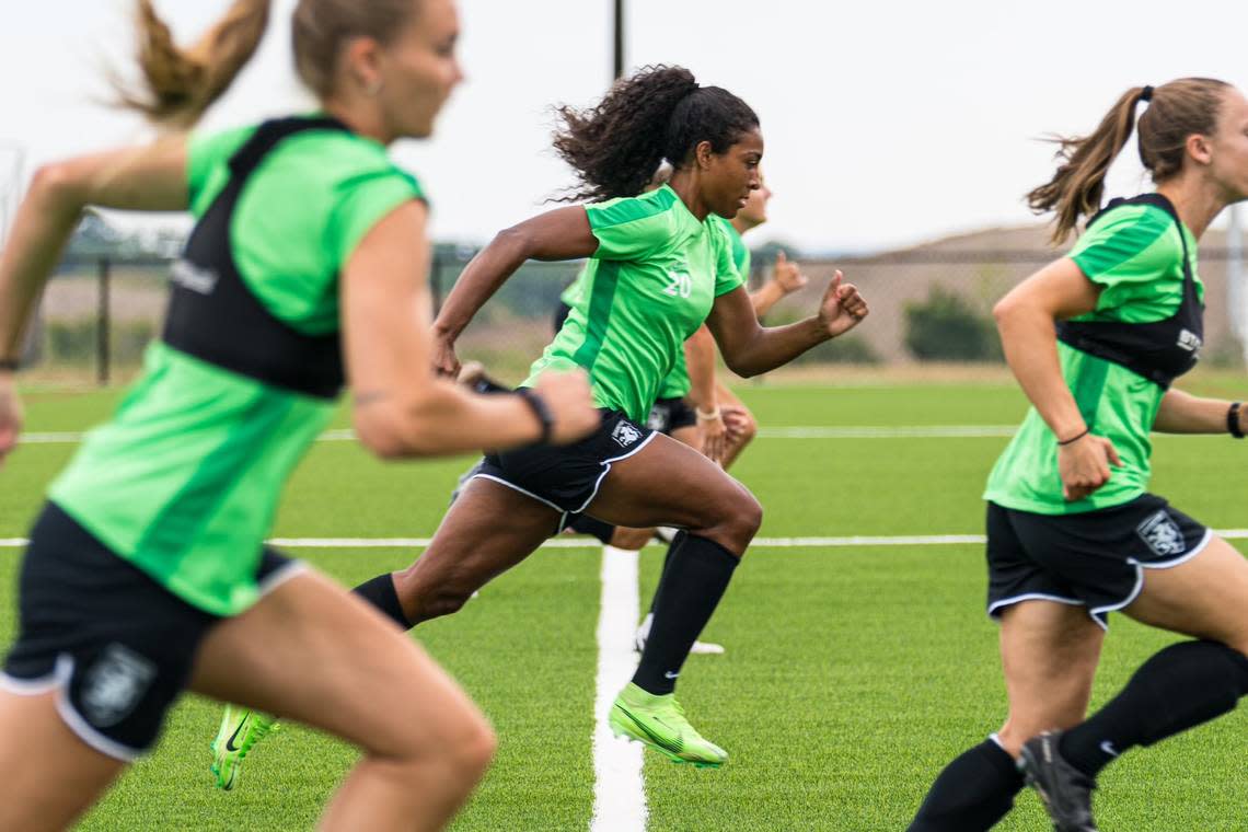 Members of the Lexington Sporting Club women’s professional soccer team run sprints during a training session. LSC is one of eight teams taking part in the 2024-25 USL Super League season.