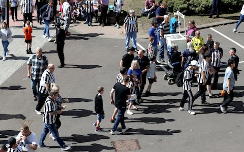 Newcastle fans arriving - Credit: PA