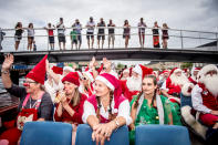 <p>People dressed as Santa Claus take part in the World Santa Claus Congress, an annual event held every summer in Copenhagen, Denmark, July 23, 2018. (Photo: Mads Claus Rasmussen/Ritzau Scanpix via Reuters) </p>