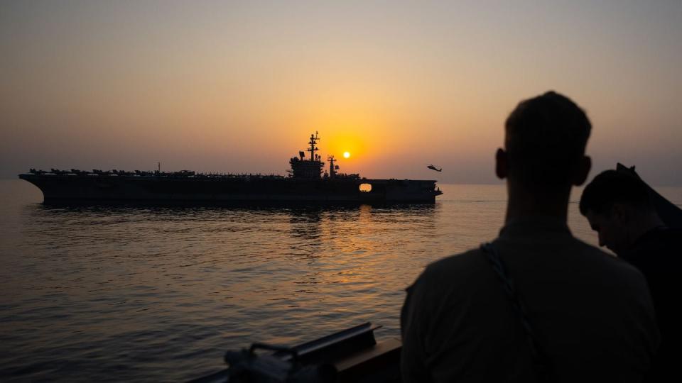 The Navy destroyer Mason gets resupplied by the aircraft carrier Dwight D. Eisenhower in the Red Sea in January. (Mass Communication Specialist 1st Class Chris Krucke/Navy)