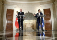 Greek Prime Minister Alexis Tsipras and Turkish President Tayyip Erdogan attend a press conference following their meeting at the Maximos Mansion in Athens, Greece December 7, 2017. REUTERS/Costas Baltas