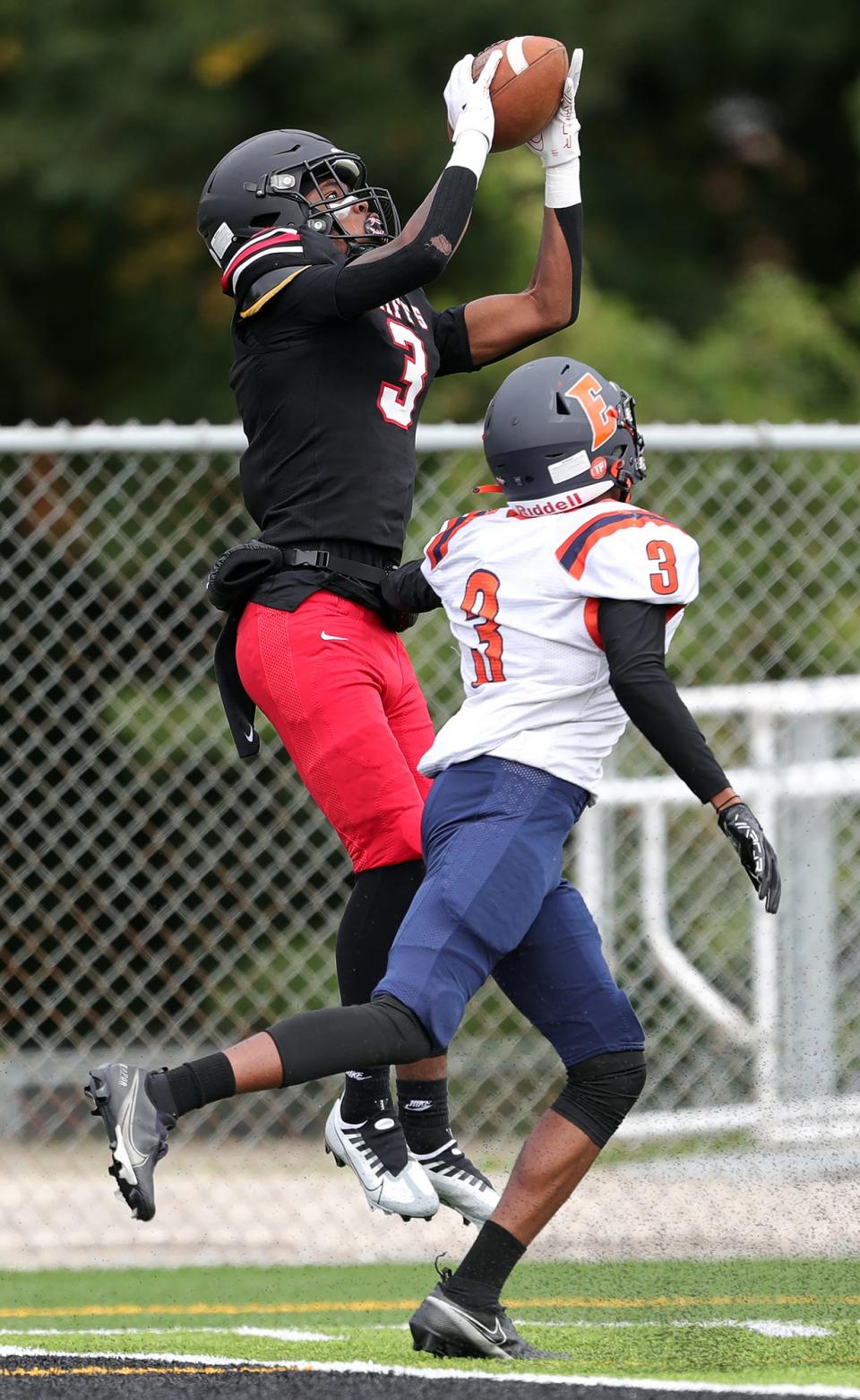 Buchtel wide receiver Marcel Boyce Jr. catches a first-half TD pass over Ellet defensive back Marquis Sims, Saturday, Sept. 24, 2022.