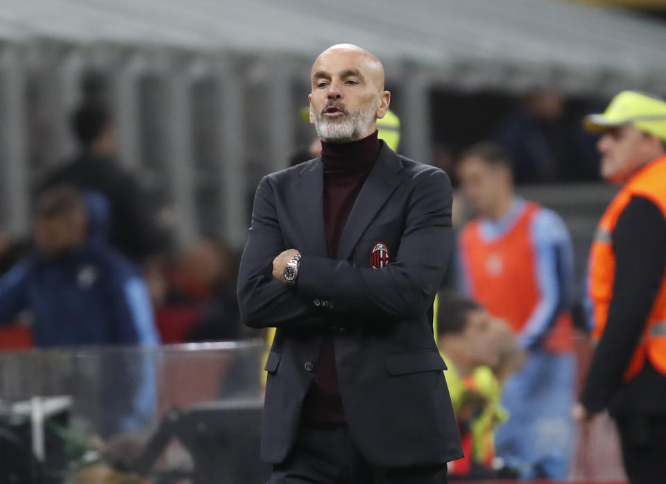 AC Milan's manager Stefano Pioli reacts during the Serie A soccer match between AC Milan and Lazio at the San Siro stadium, in Milan, Italy, Sunday, Nov. 3, 2019, (AP Photo/Antonio Calanni)