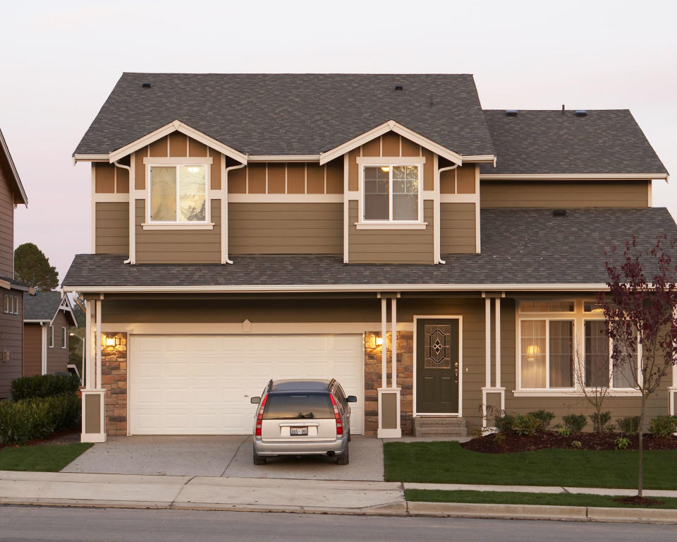 house exterior with car in drive