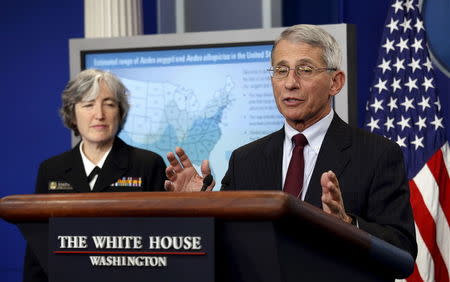 Dr. Anthony Fauci (R), director of the National Institute for Allergy and Infectious Disease, and Dr. Anne Schuchat, Principal Deputy Director for Centers of Disease Control Prevention, speak about the Zika virus at the White House in Washington April 11, 2016. REUTERS/Kevin Lamarque