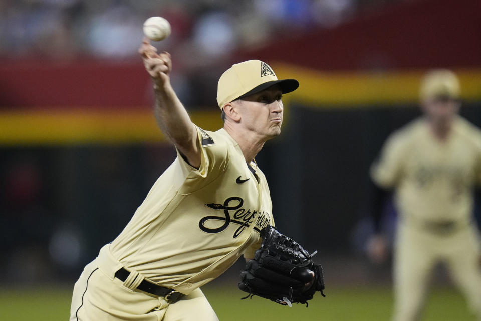 Arizona Diamondbacks starting pitcher Zach Davies throws against the Chicago Cubs during the first inning of a baseball game Saturday, Sept. 16, 2023, in Phoenix. (AP Photo/Ross D. Franklin)