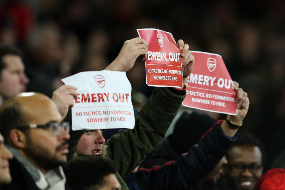 LONDON, ENGLAND - NOVEMBER 28: Arsenal fans hold up signs saying "Emery out" during the UEFA Europa League group F match between Arsenal FC and Eintracht Frankfurt at Emirates Stadium on November 28, 2019 in London, United Kingdom. (Photo by Craig Mercer/MB Media/Getty Images)