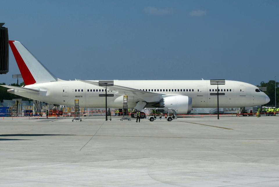 The first Boeing 787 manufactured in South Carolina is parked outside the Boeing plant in North Charleston, S.C., before its maiden flight on Wednesday, May 23, 2012. It's the first plane manufactured at the $750 million assembly plant that opened last summer. (AP Photo/Bruce Smith)