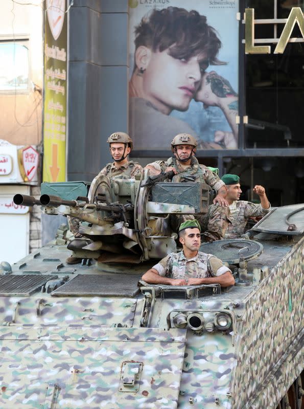 Lebanese army soldiers patrol a street in Beirut