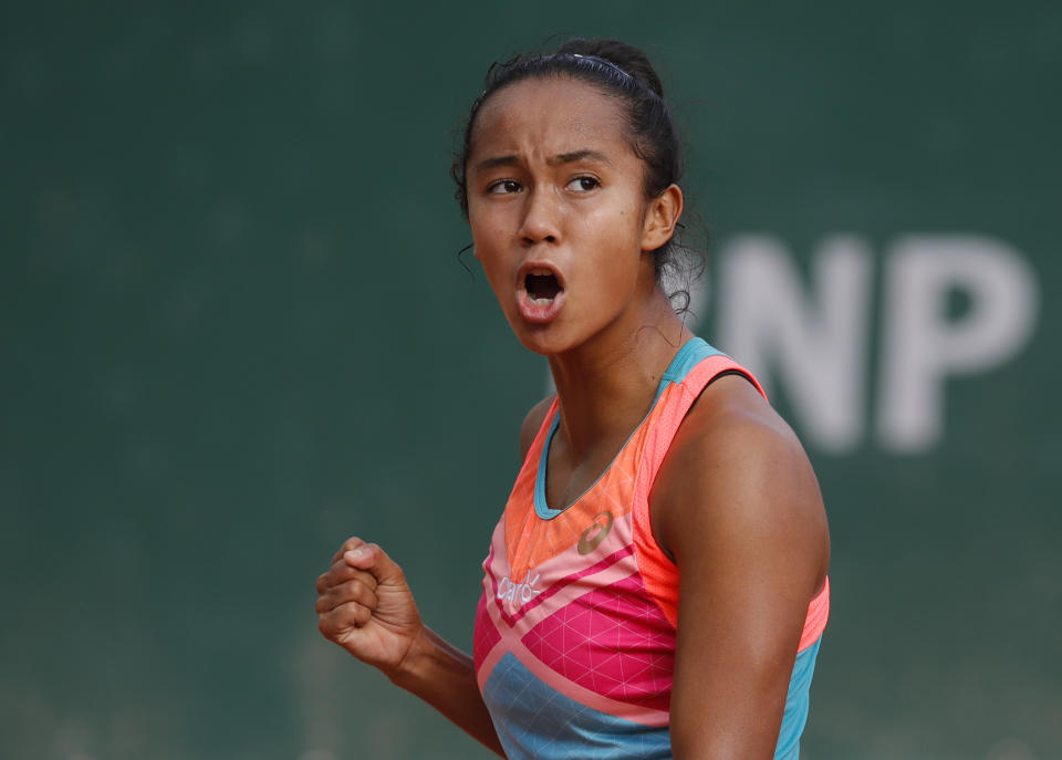 Canada's Leylah Fernandez clenches her fist after scoring a point against Slovenia's Polona Hercog in the second round match of the French Open tennis tournament at the Roland Garros stadium in Paris, France, Thursday, Oct. 1, 2020. (AP Photo/Christophe Ena)